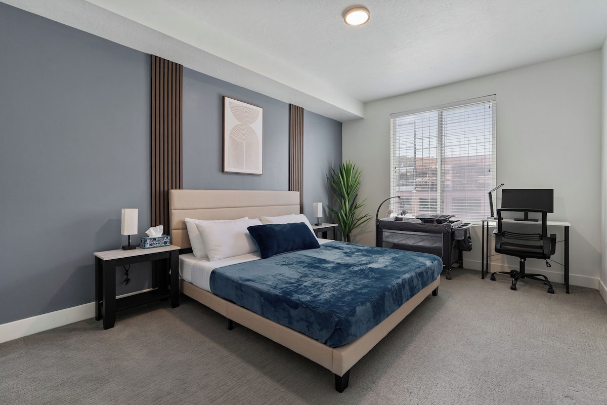 Desk, laptop workspace, blackout curtains, free WiFi