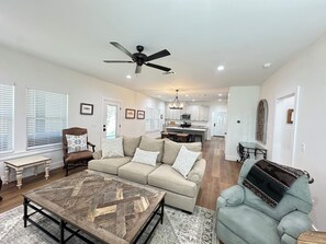 Living area - Brand new, pond front 2-bedroom cottage with AC in delightful Samson (Samson)