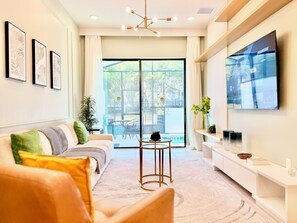 Living area - Modern Getaway w/Game Room + Pvt Pool + BBQ Near Universal and I-Drive (Orlando)