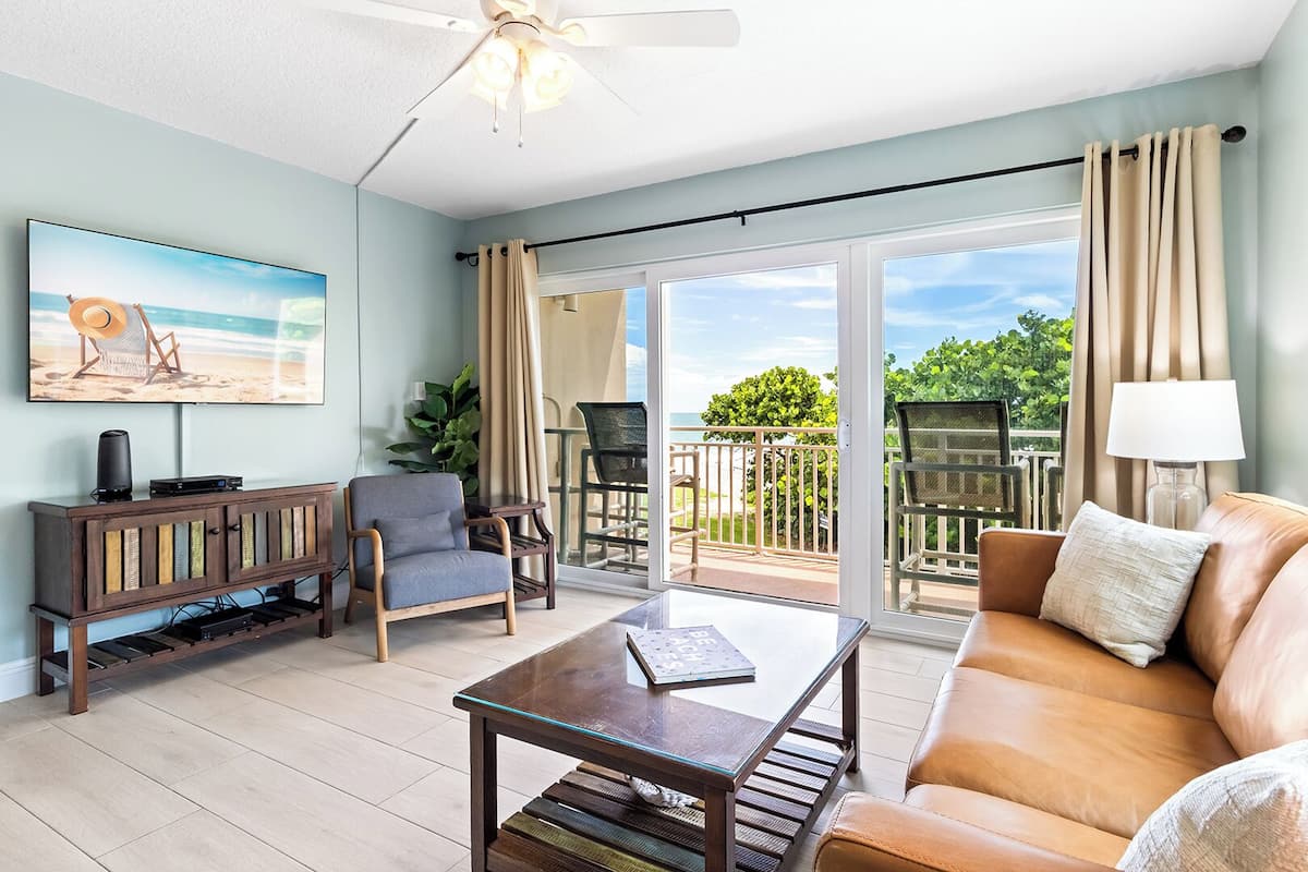 Two-Story Oceanfront Condo - Unit #231 | Living area | TV