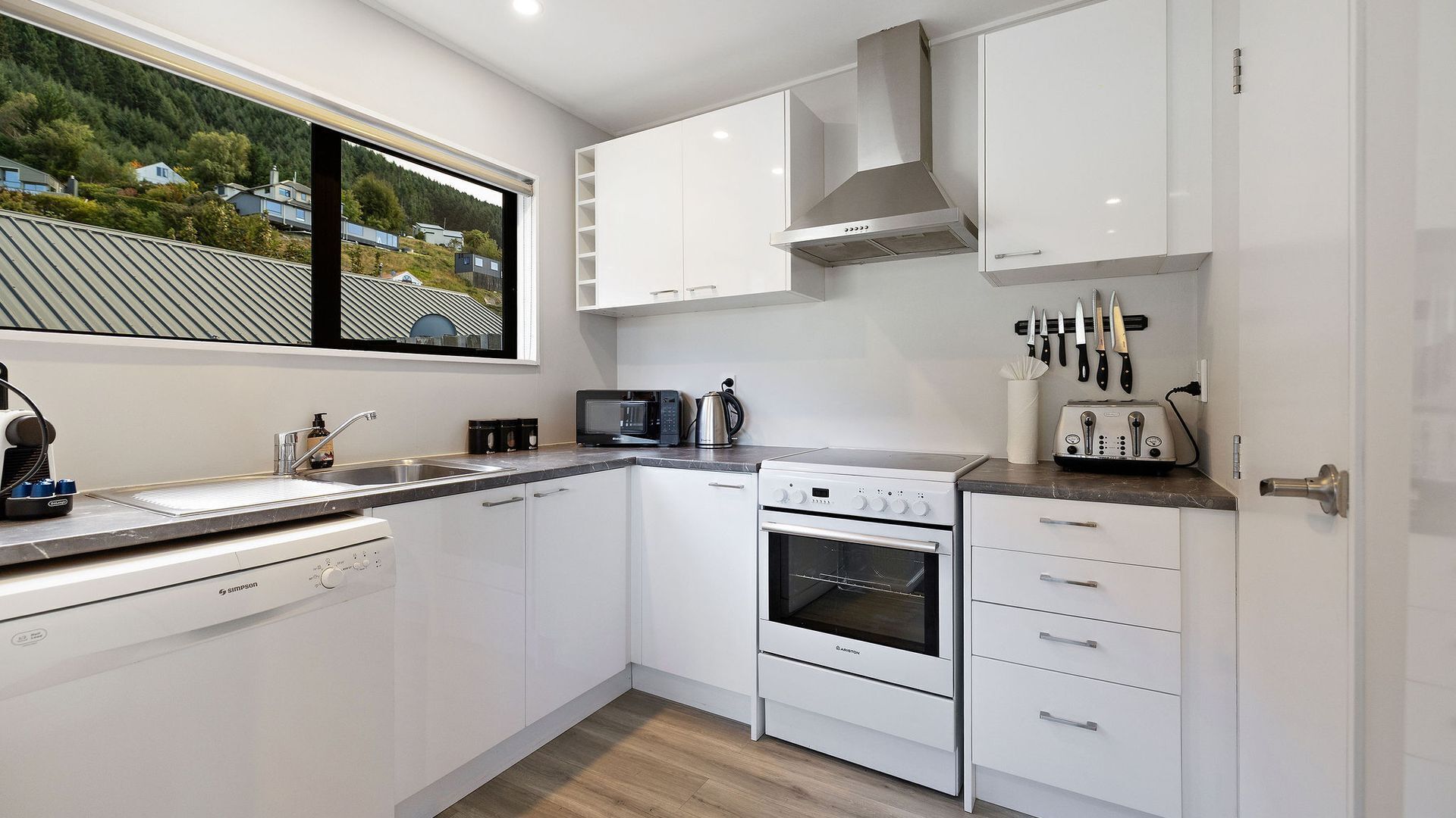 Coffee/tea maker, fridge, microwave, oven