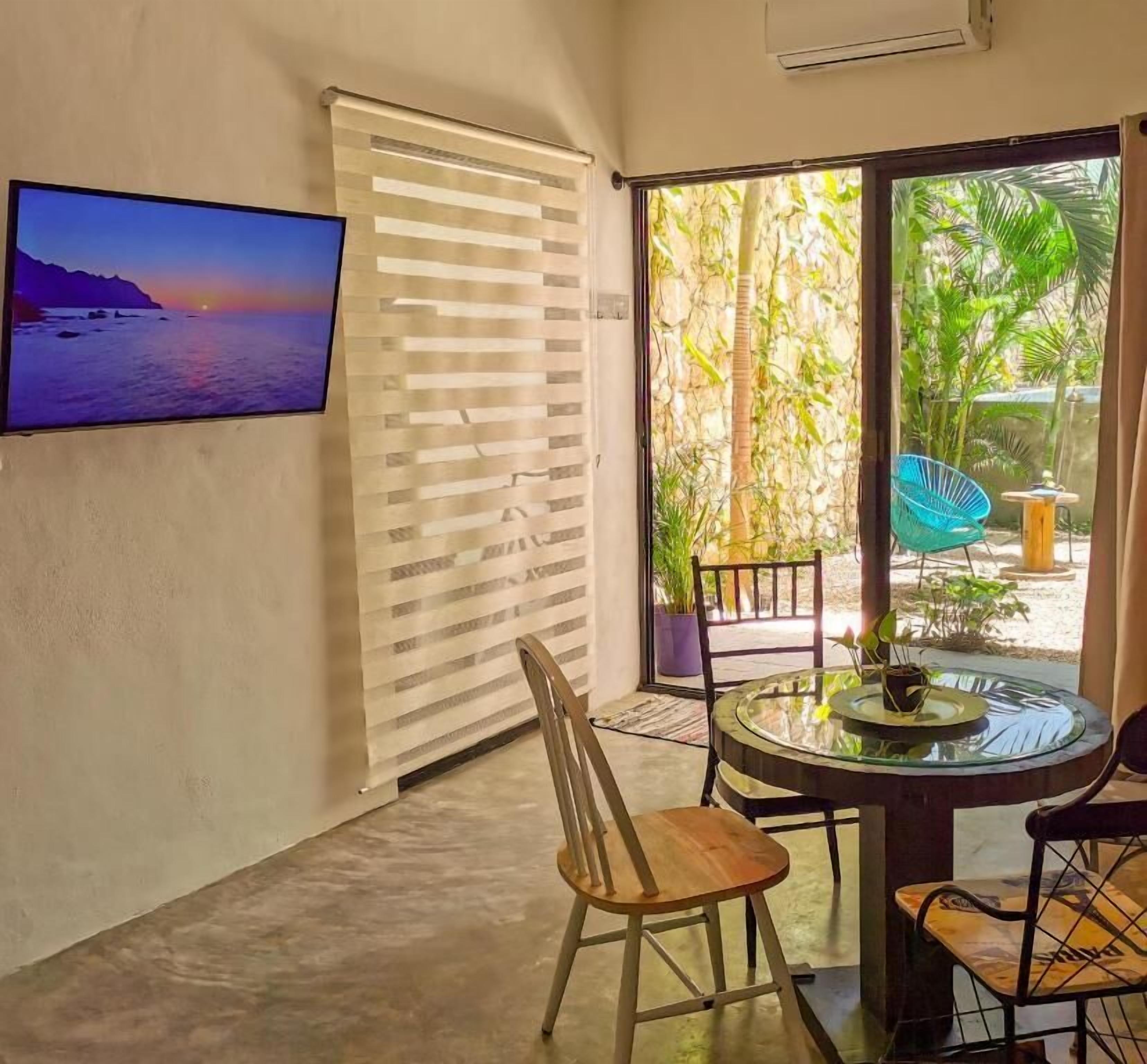 Deluxe Quadruple Room, Courtyard View | Interior