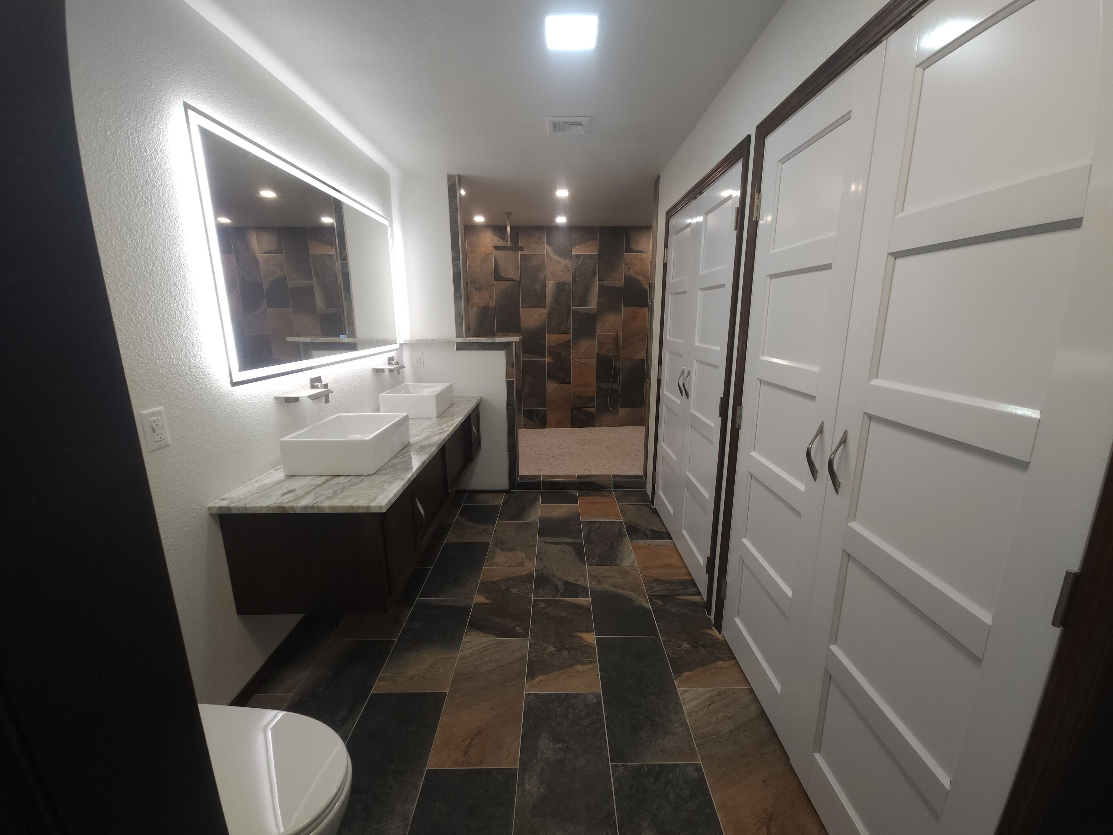 Shower, hair dryer, towels, toilet paper