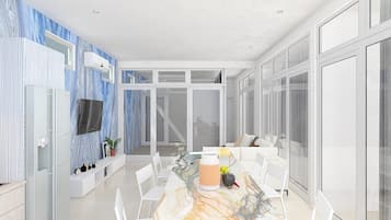 Casa Deluxe, vistas al mar | Restauración