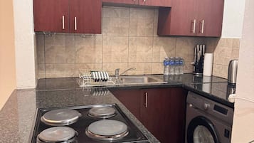 Apartamento, 1 quarto, para fumantes | Lavanderia