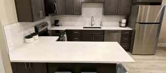 King Suite with Twin Loft – Family Friendly