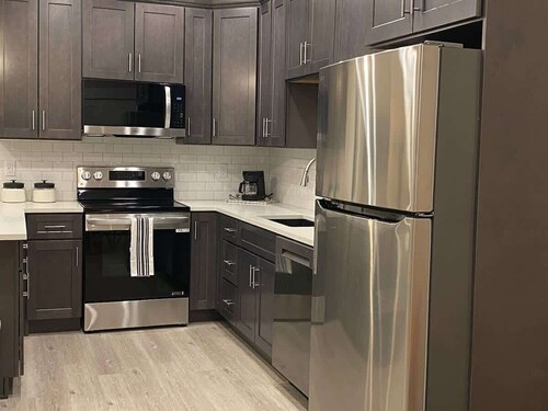 Upscale Suite with Spacious Living - Waffles too!