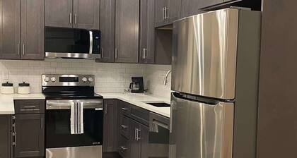 Upscale Suite with Spacious Living - Waffles too!