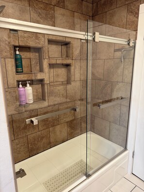 Shower, hair dryer, towels, soap