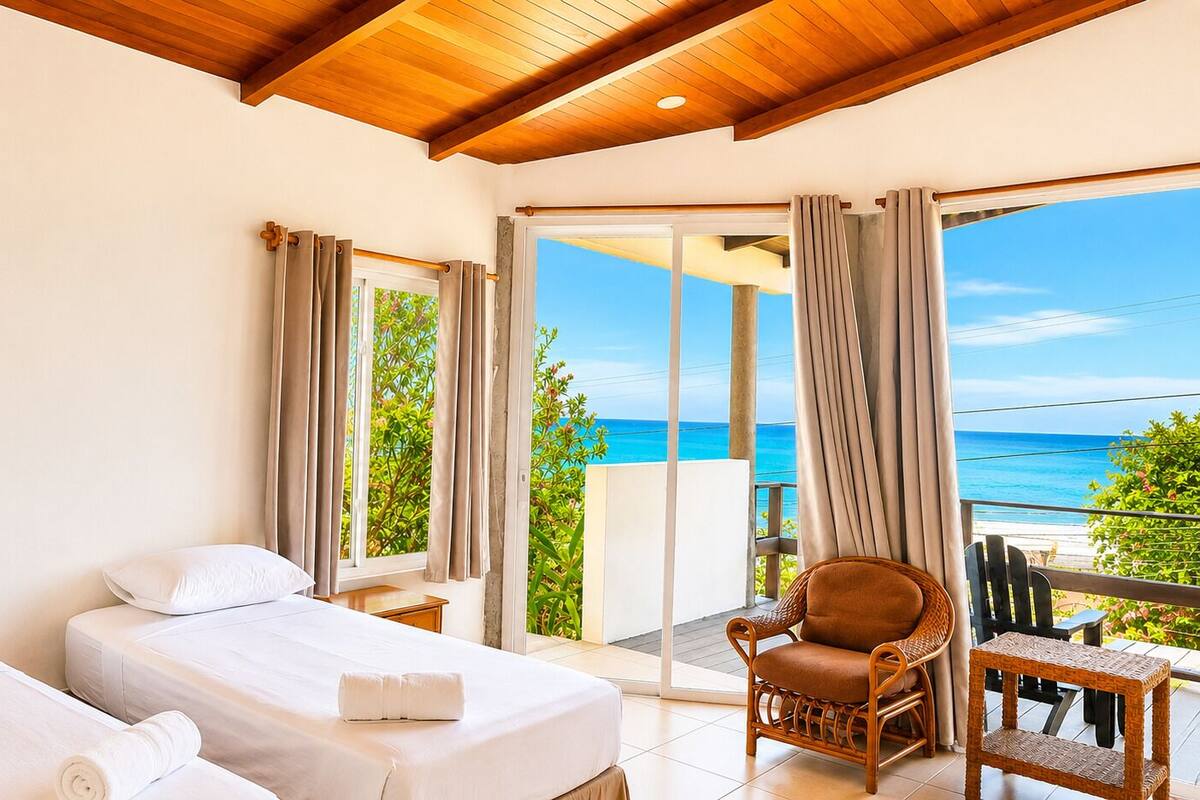 Chambre avec lits jumeaux, vue mer | Wi-Fi gratuit, draps fournis