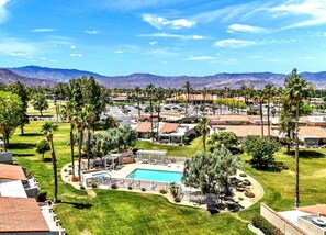 Outdoor pool, a heated pool - Palm Desert Resort Escape: Golf, Pickleball & Pools (Palm Desert)