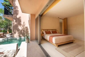 A bedroom with a bed, a view of a pool, and a balcony. - Elegant 3BR in Aldea Zama with Private Pool (Tulum)