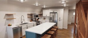 Fridge, microwave, oven, stovetop - The Maple. New 4 room, 2 bath cabin on Menonminee River w/ fireplace, hot tub. (Marinette)