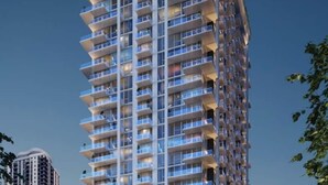 Een hoog gebouw met meerdere balkons, grote ramen en een plat dak.