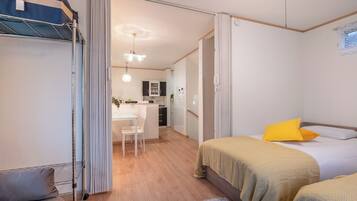 Comfort House, 4 Bedrooms, Non Smoking, Balcony | Desk, laptop workspace, blackout drapes, iron/ironing board