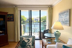 TV, books - Island Club 105 Beach Condo | Lagoon Views (Hilton Head Island)
