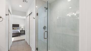 Shower, hair dryer, towels, soap