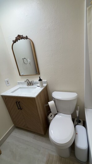 Hair dryer, towels, soap, toilet paper