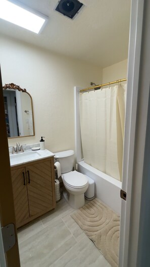 Hair dryer, towels, soap, toilet paper