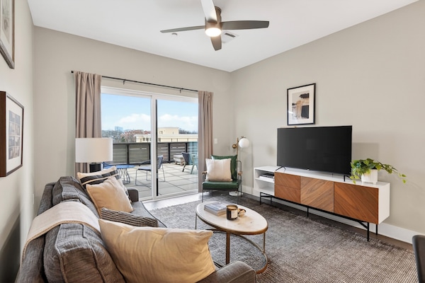 One-Bedroom | Living area | 40-inch Smart TV with digital channels