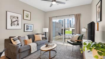 One-Bedroom | Living area | 40-inch Smart TV with digital channels