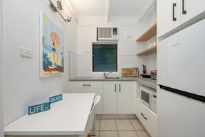 Fridge, microwave, toaster, cookware/dishes/utensils