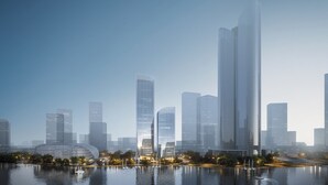 Eine moderne Skyline mit Hochhäusern, einer Uferpromenade und einem markanten, gebogenen Gebäude.
