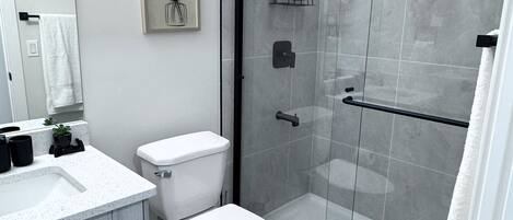 Shower, towels, soap, shampoo