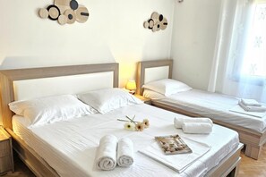 Familienapartment, Mehrere Schlafzimmer (Pool View Palm 002) | 1 Schlafzimmer, kostenloses WLAN, Bettwäsche