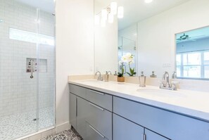 Shower, eco-friendly toiletries, hair dryer, towels