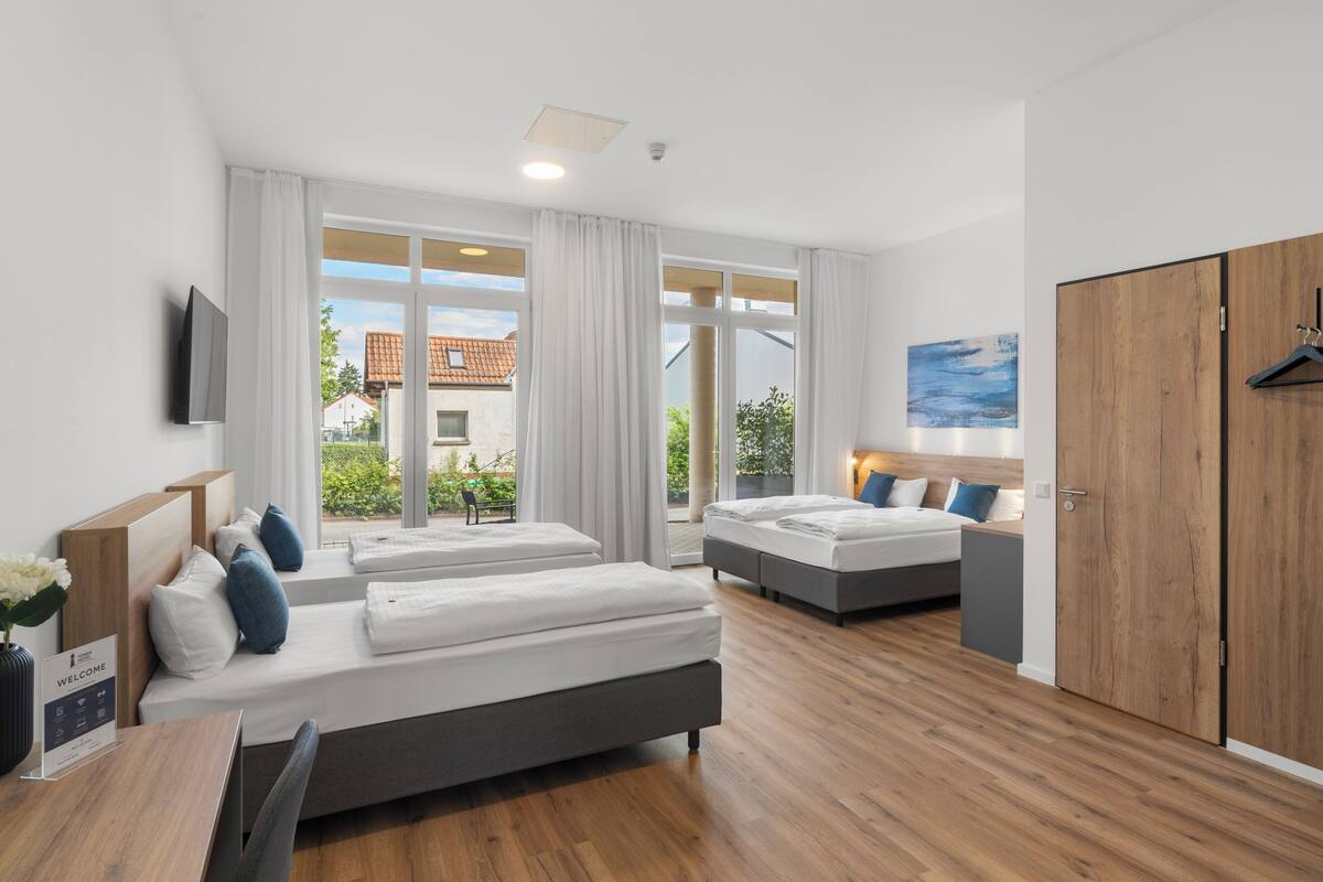 Triple Room | Free minibar, desk, laptop workspace, blackout curtains