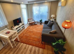 Apartment, Balcony, City View | Living area | Computer monitors