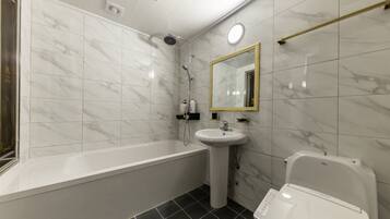 Twin Room | Bathroom | Hair dryer, bathrobes, slippers, bidet