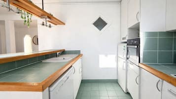 Apartment | Private kitchen | Fridge, microwave, oven, stovetop