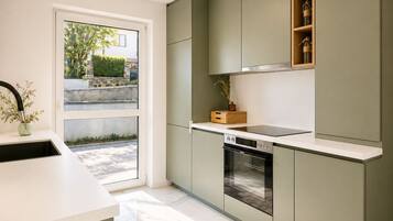 Luxury Villa | Private kitchen | Fridge, microwave, oven, stovetop