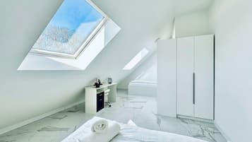 Laptop workspace, iron/ironing board, free WiFi, bed sheets