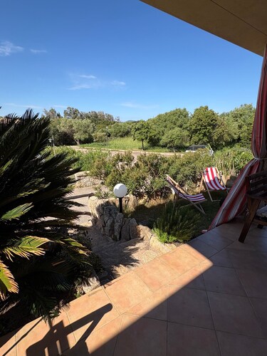 Holiday Home 'Appartamento Baia 12' with Private Garden, Wi-Fi and Air Conditioning