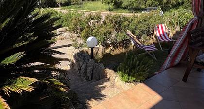 Holiday Home 'Appartamento Baia 12' with Private Garden, Wi-Fi and Air Conditioning