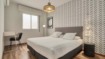 Comfort Apartment, City View | Blackout drapes, iron/ironing board, free WiFi