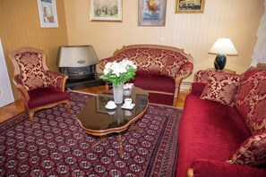 Appartement Familial, 2 chambres, balcon, vue jardin | Coin séjour