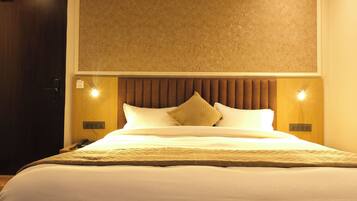 Deluxe Room | Egyptian cotton sheets, premium bedding, down duvets, memory-foam beds