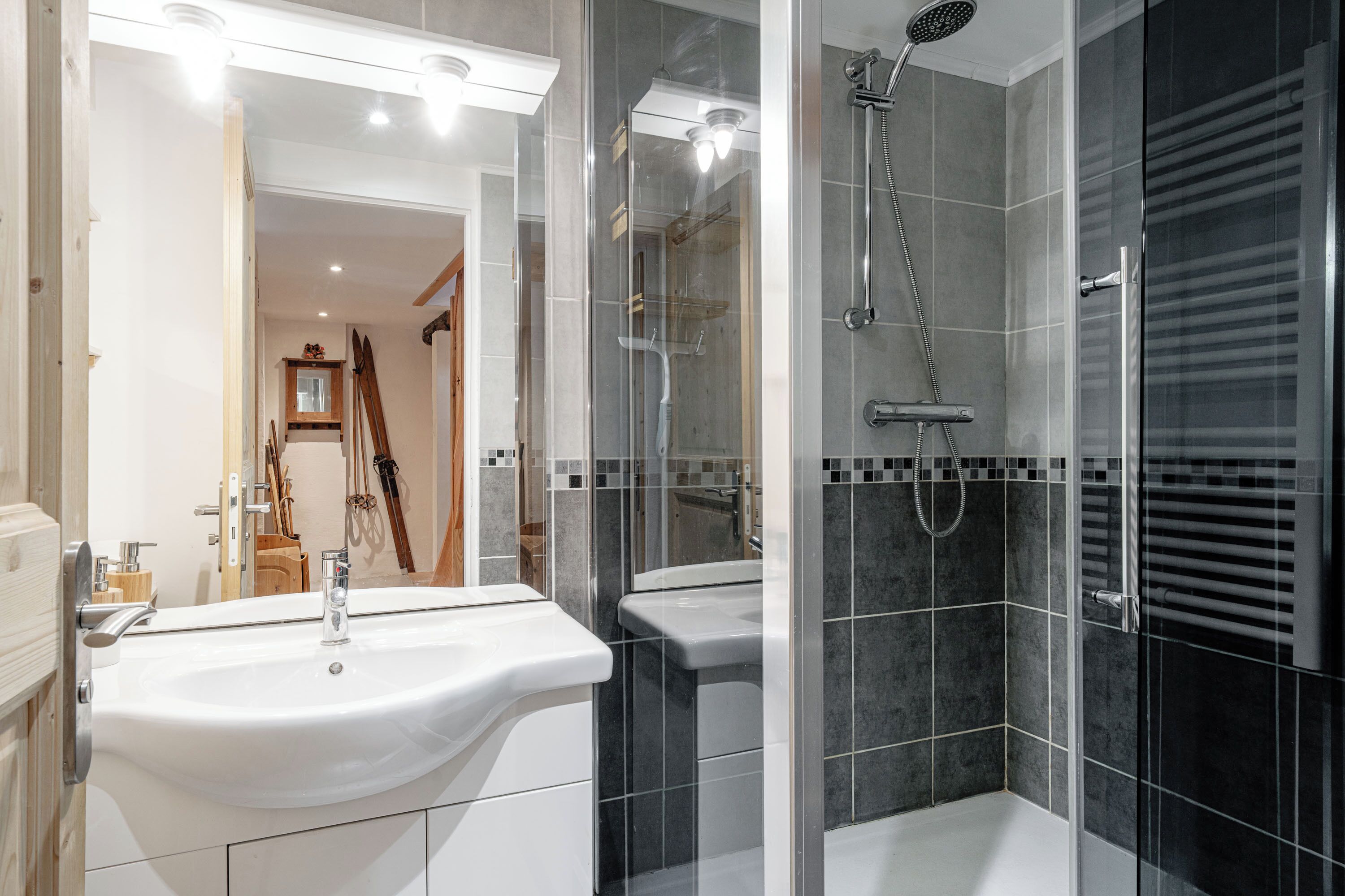Shower, hair dryer, towels, toilet paper