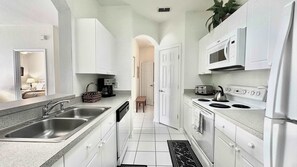 Condo, Multiple Beds, Balcony, Garden View (Universal Palms Retreat) | Private kitchen - Universal Palms Retreat at Windsor Palms (Kissimmee)