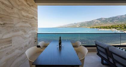 Exclusive 4**** penthouse apartment directly by the sea, with 100sqm roof terrace.