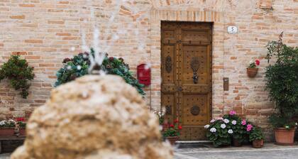 Historic home overlooking the main square in an Italian village