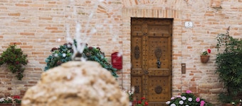 Historic home overlooking the main square in an Italian village