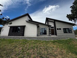 Exterior - Luxury 6BR Mountain Retreat | Sleeps 20 | Theater, Hot Tub & Fire Pit<br>Spacious 4,500 sq ft home perfect for large groups, weddings & retreats near the Air Force Academy.<br>Enjoy a private acre, entertainment basement, outdoor living, peaceful Mtn (Monument)