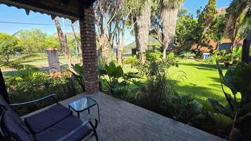 Habitación Deluxe, 1 cama de matrimonio grande | Terraza o patio