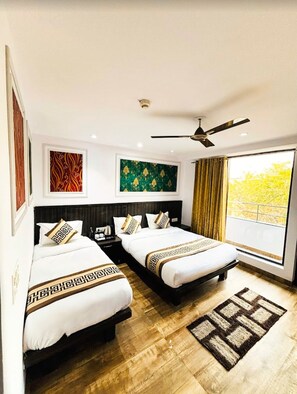 Chambre triple Deluxe, balcon, vue sur la ville