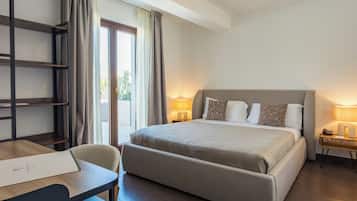 Premium bedding, memory-foam beds, in-room safe, desk